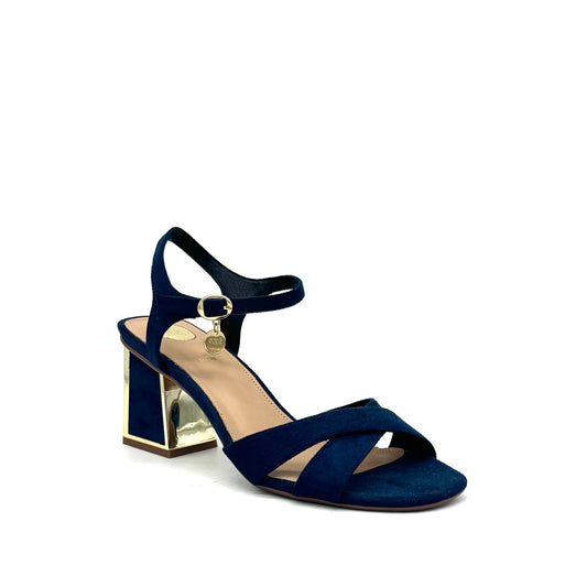 Navy: EXE Mina-190 cross-strap block heel sandal in navy with gold-mirrored heel and ankle strap charm detail, side view