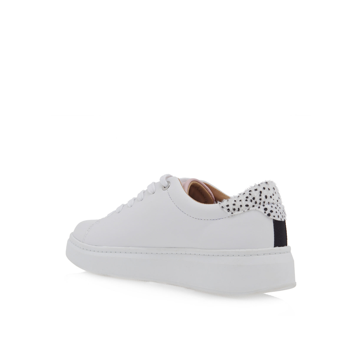 Rear three-quarter view of Renato Garini 21VW2007 white platform sneaker showing its spotted heel tab and thick white sole