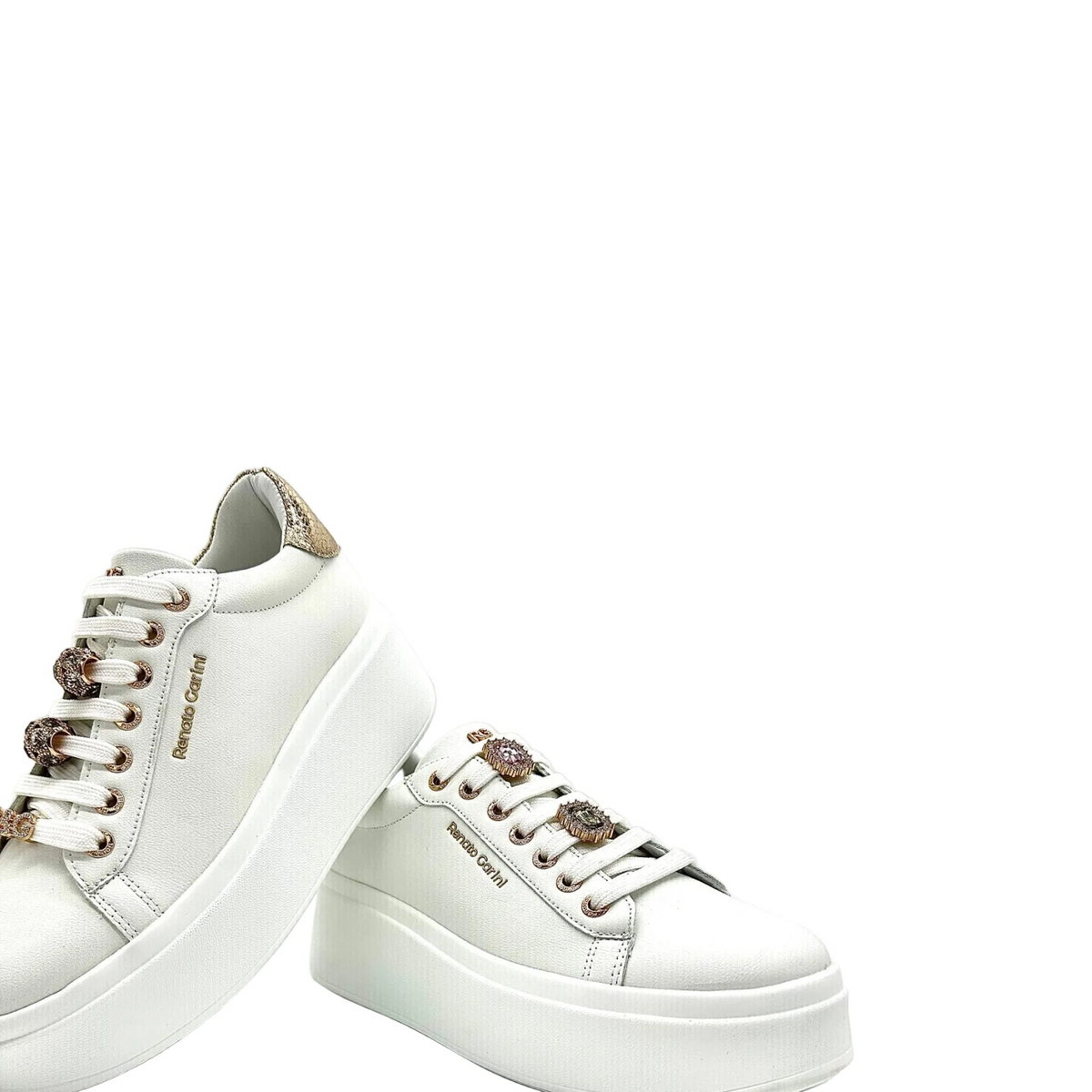RENATO GARINI 88-32 white embellished lace-up platform sneakers, close-up angle highlighting sparkling removable lace ornaments and gold-tone eyelets