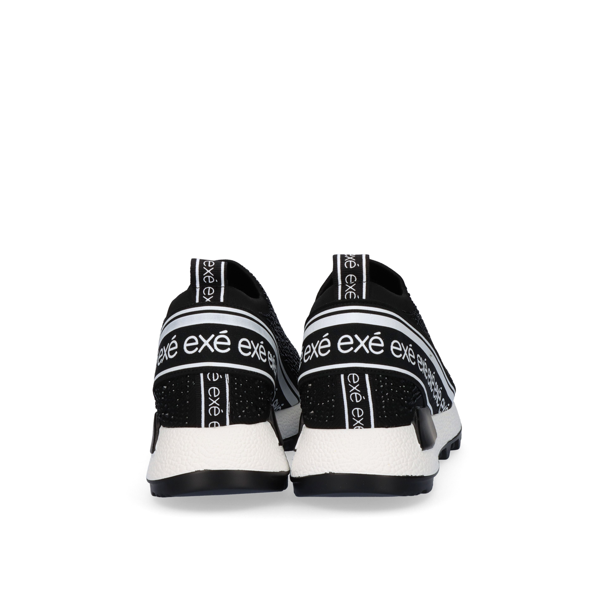 Rear view of Renato Garini EX9210A Black Silver slip-on sneakers showing lettered heel bands, pull tabs and white soles