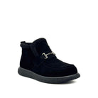 BONAVI Juniper suede moc shoe in black with shearling-style trim and buckle detail, angled view