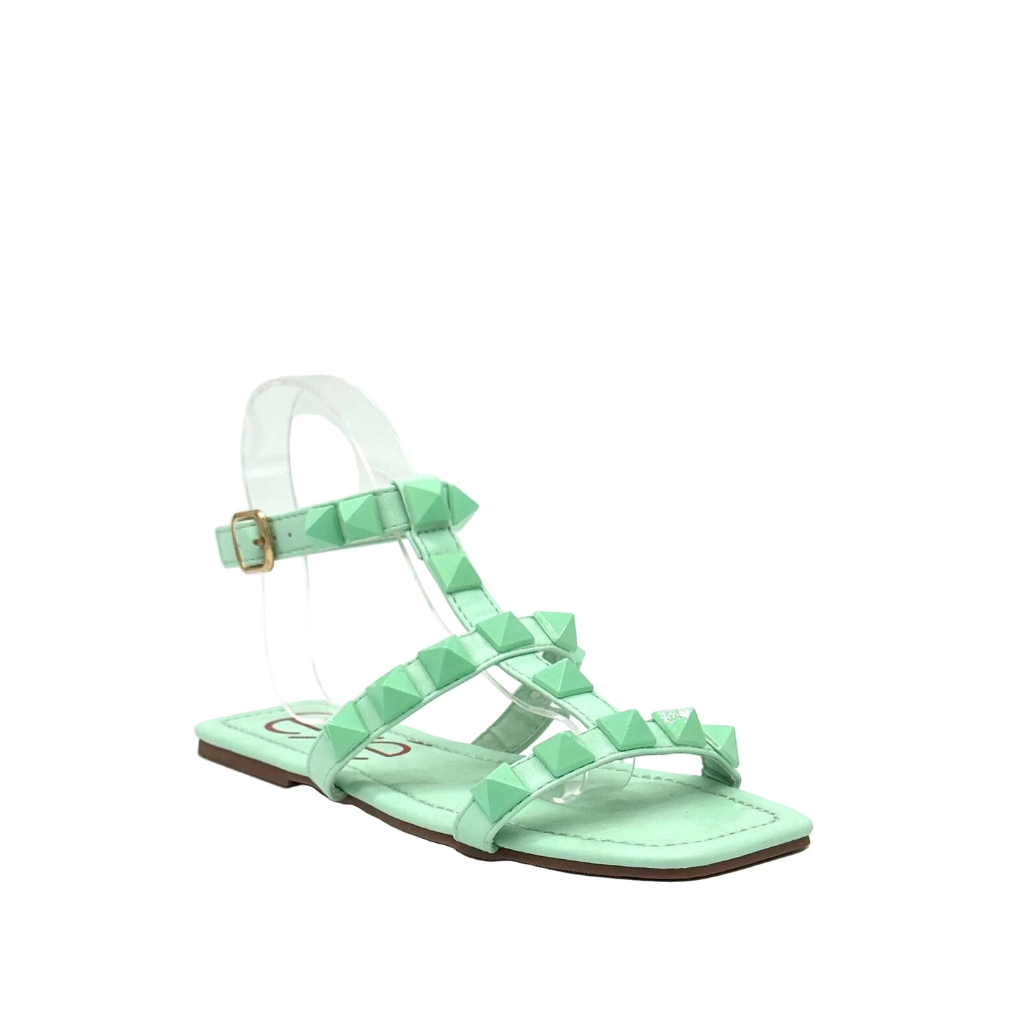 Mint: EXE 2269-2781 pyramid stud T-strap flat sandal in mint with gold-tone ankle buckle and square toe, side view