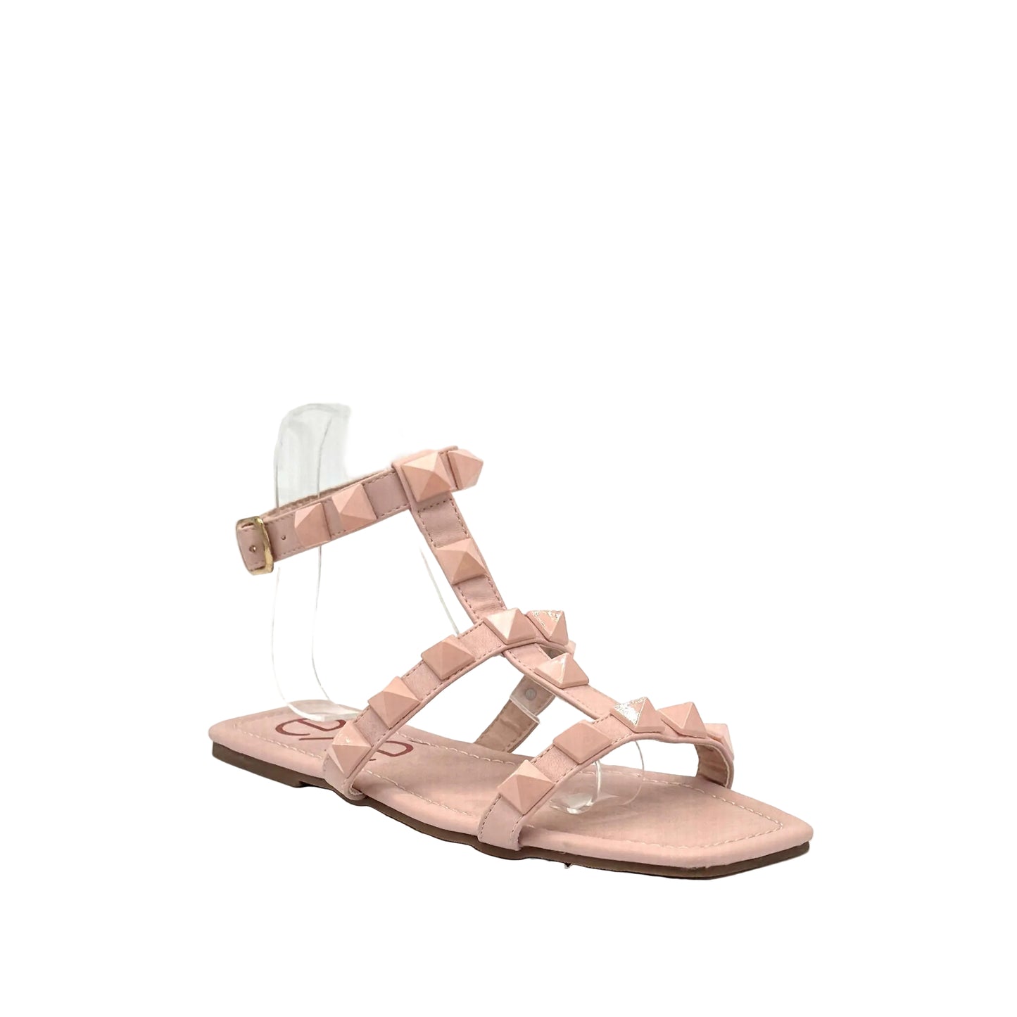 Pink: EXE 2269-2781 pyramid stud T-strap flat sandal in pink with gold-tone ankle buckle and square toe, side view