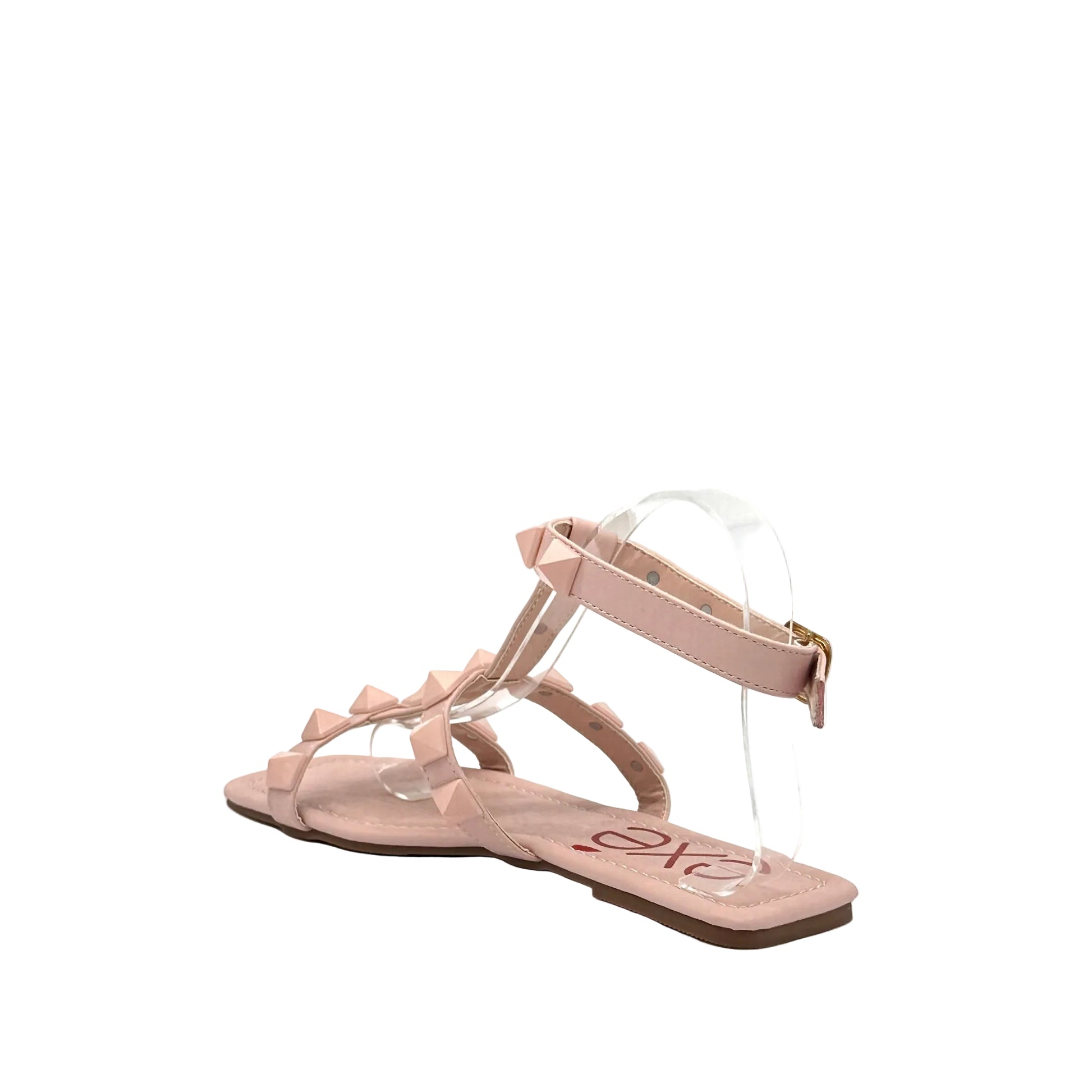Pink: EXE 2269-2781 pyramid stud T-strap flat sandal in pink with gold-tone ankle buckle and square toe, side view
