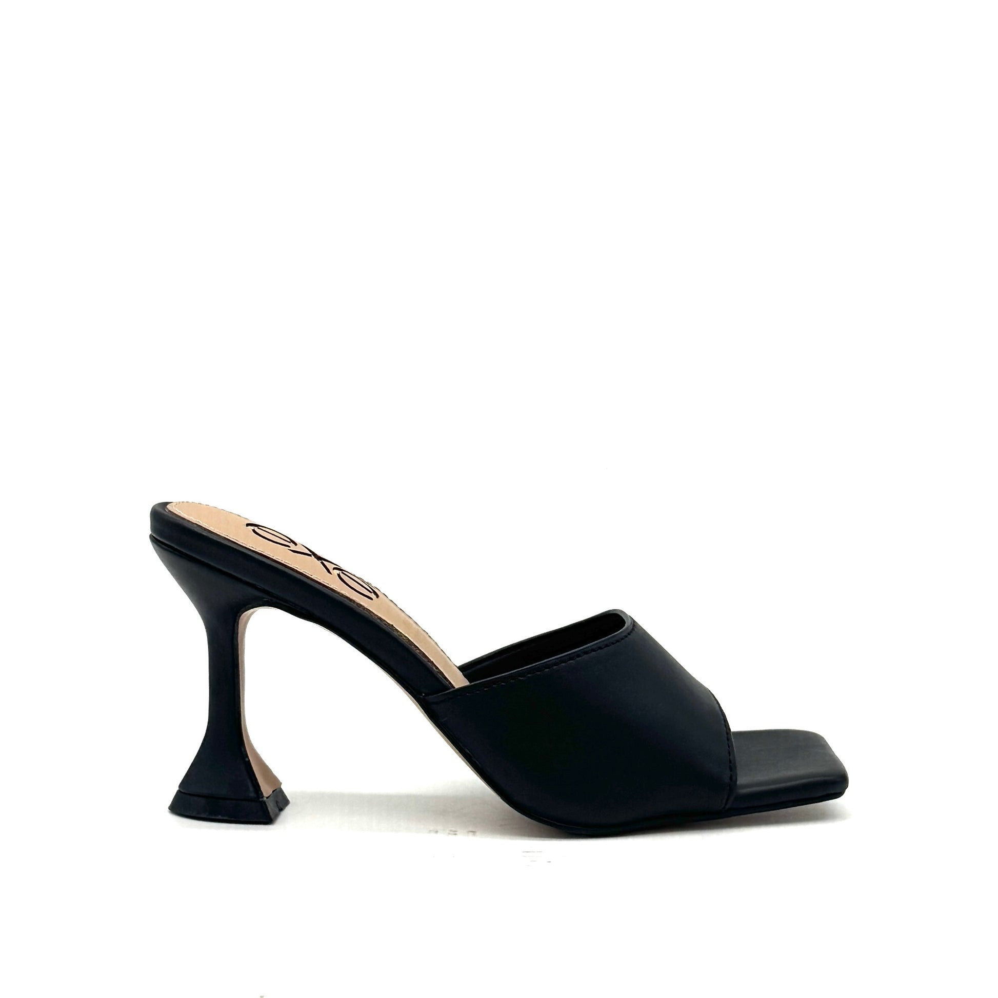 Black: EXE Bianca-700 wide-band sculptural heel slide sandal in black with flared heel and square toe, side view