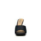 Black: EXE Bianca-700 wide-band sculptural heel slide sandal in black with flared heel and square toe, side view