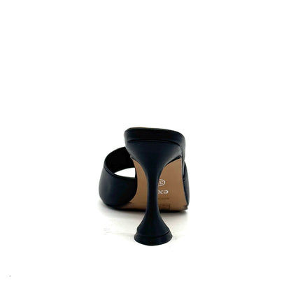 Black: EXE Bianca-700 wide-band sculptural heel slide sandal in black with flared heel and square toe, side view