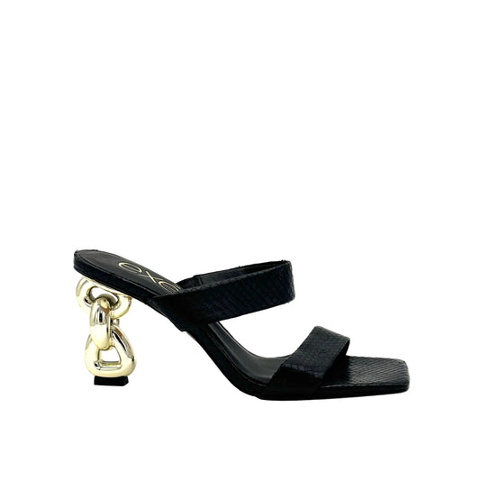 Black: EXE Dolly-155 double-strap chain-link heel slide sandal in black with textured upper and gold sculptural chain-link heel, side view