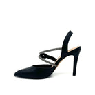 Black: EXE Garde-294 black pointed toe slingback heel with rhinestone strap detail