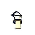 Navy: EXE Mina-190 cross-strap block heel sandal in navy with gold-mirrored heel and ankle strap charm detail, side view
