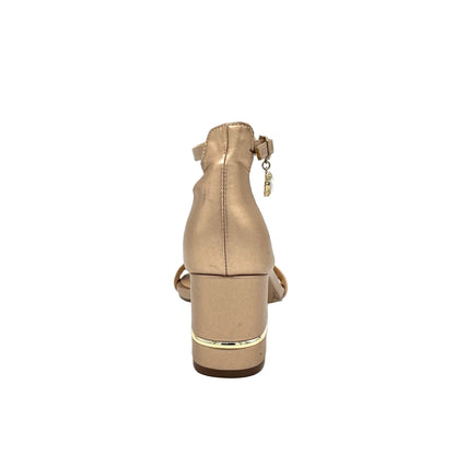 Champagne: EXE Penny-299 single-strap block heel sandal in champagne with crystal drop charm and gold-trim heel, side view
