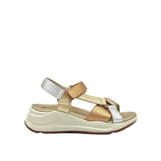 Gold/Silver: EXE RT1 metallic multi-strap sport sandal in gold and silver with chunky white platform sole, side view