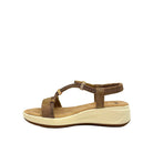 Tan: EXE RT3 embellished T-strap sport wedge sandal in tan with rose gold hardware detail and elastic ankle strap, side view