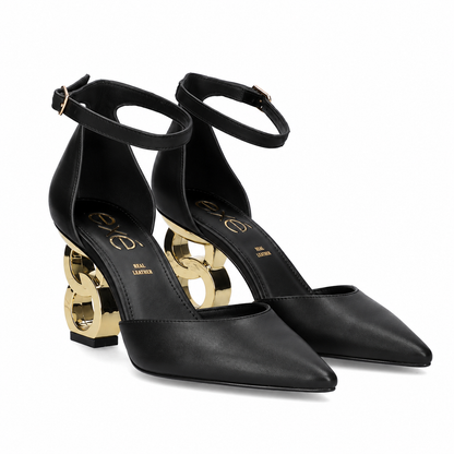 Black: EXE Sara-210 chain-link heel pointed pump in black with gold sculptural chain-link heel, side view
