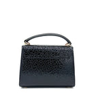 Black patent leather Karya Mila top handle satchel with embossed texture and gold hardware