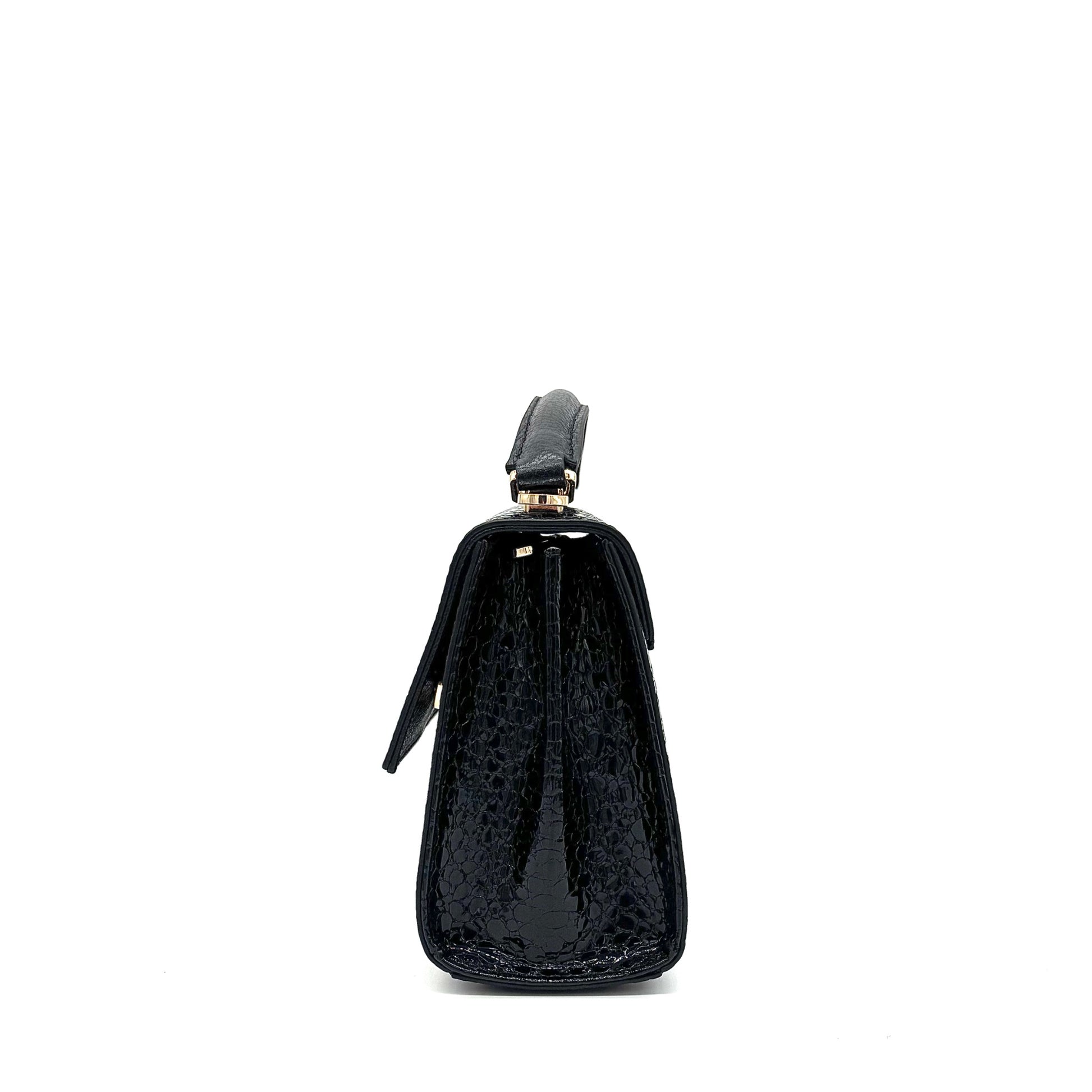 Black patent leather Karya Mila top handle satchel with embossed texture and gold hardware