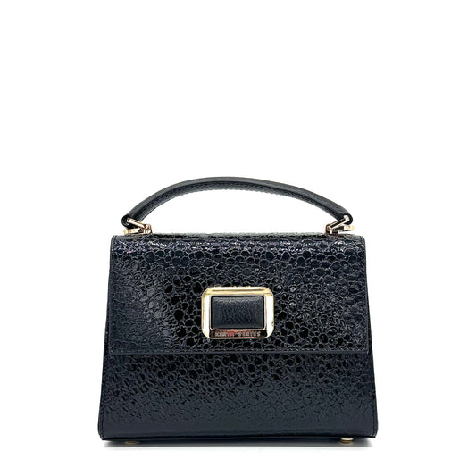 Black patent leather Karya Mila top handle satchel with embossed texture and gold hardware