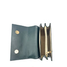 Emerald patent leather Karya Mila top handle satchel with embossed texture and gold hardware
