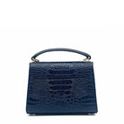 Midnight navy patent leather Karya Mila top handle satchel with embossed texture and gold hardware