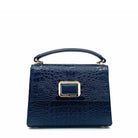 Midnight navy patent leather Karya Mila top handle satchel with embossed texture and gold hardware