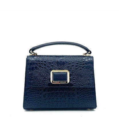 Midnight navy patent leather Karya Mila top handle satchel with embossed texture and gold hardware