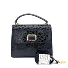 Black patent croc-embossed Karya Vera top handle satchel with gold clasp hardware