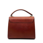 Cognac genuine leather Karya Vera top handle satchel with gold hardware and detachable crossbody strap
