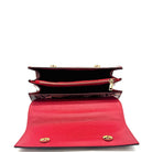 Red multicolor snake-embossed Karya Vera top handle satchel with red leather handle and gold hardware