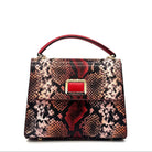 Red multicolor snake-embossed Karya Vera top handle satchel with red leather handle and gold hardware