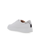 Rear three-quarter view of Renato Garini 21VW2007 white platform sneaker showing its spotted heel tab and thick white sole