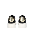 Back view of Renato Garini Butterfly black platform sneakers showing gold-tone textured heel panels above white platform soles