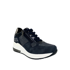 Renato Garini EX34 blue wedge sneaker at a three-quarter angle, showing sparkling panels, dark laces, side zipper and raised white sole