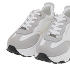 RENATO GARINI EX34 gray wedge sneakers, cropped close-up of the pair showing white laces, layered toe panels and silver-tone details