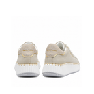 Rear angled view of Renato Garini EX96 beige sneakers showing tonal heel panels, gold-tone trim and white platform soles