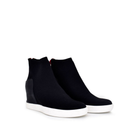 Pair of Renato Garini Regina-244 black stretch platform ankle boots at a three-quarter angle, showing rounded toes and contrasting white soles