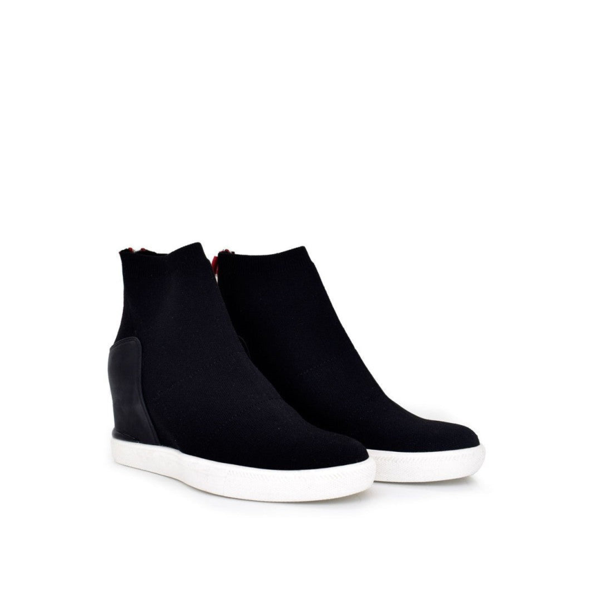 Pair of Renato Garini Regina-244 black stretch platform ankle boots at a three-quarter angle, showing rounded toes and contrasting white soles