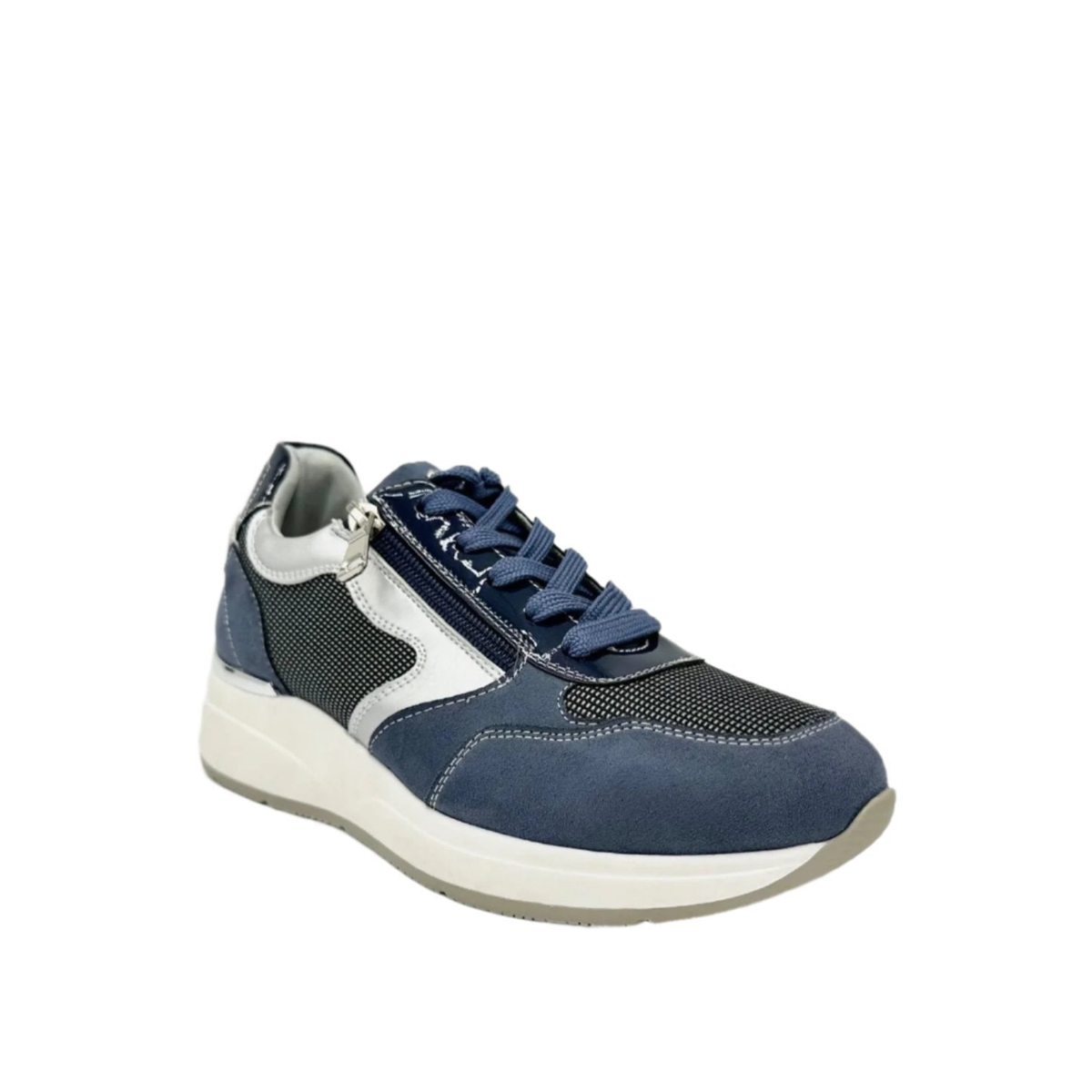 Renato Garini SEX16 sky blue platform sneaker at a three-quarter angle, showing tonal laces, patterned panels and white sole