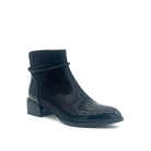 Spring Step Shelbi genuine leather ankle boot in black with patent cap toe, studded ankle strap and block heel, three-quarter view