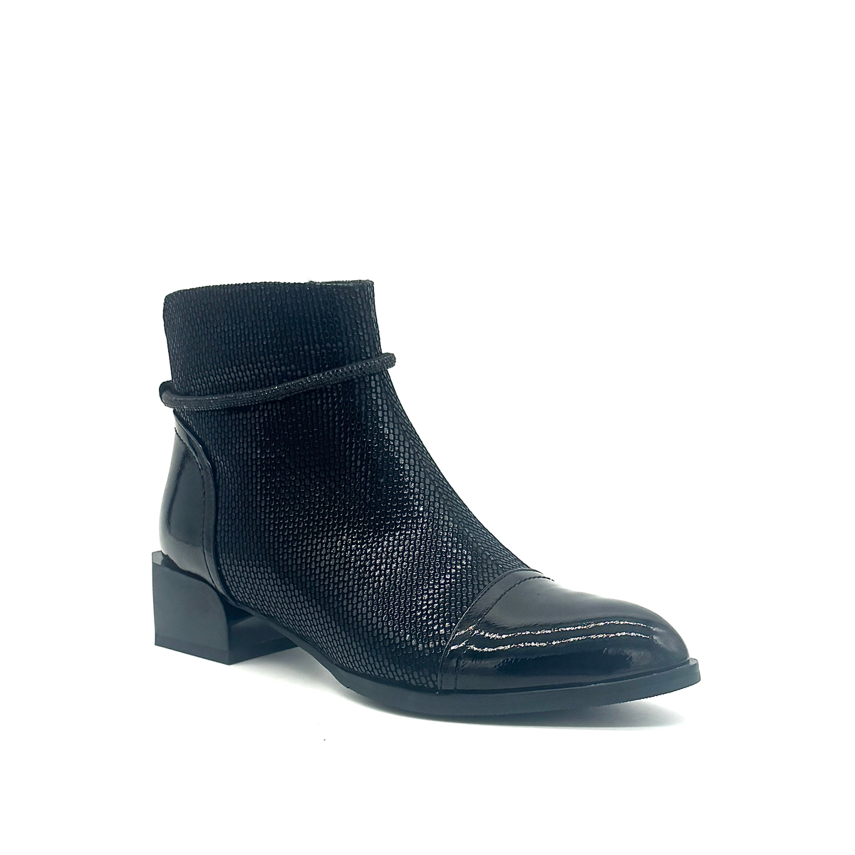 Spring Step Shelbi genuine leather ankle boot in black with patent cap toe, studded ankle strap and block heel, three-quarter view