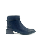 Spring Step Shelbi genuine leather ankle boot in navy with patent cap toe, studded ankle strap and block heel, side view