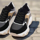 Renato Garini 22S EX31 black and blue platform sneakers styled together, showing lace-up fronts and sculpted white soles