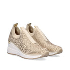 Pair of Renato Garini WEX22 gold rhinestone slip-on sneakers at a three-quarter angle, showing ribbed collars and raised white wedge soles