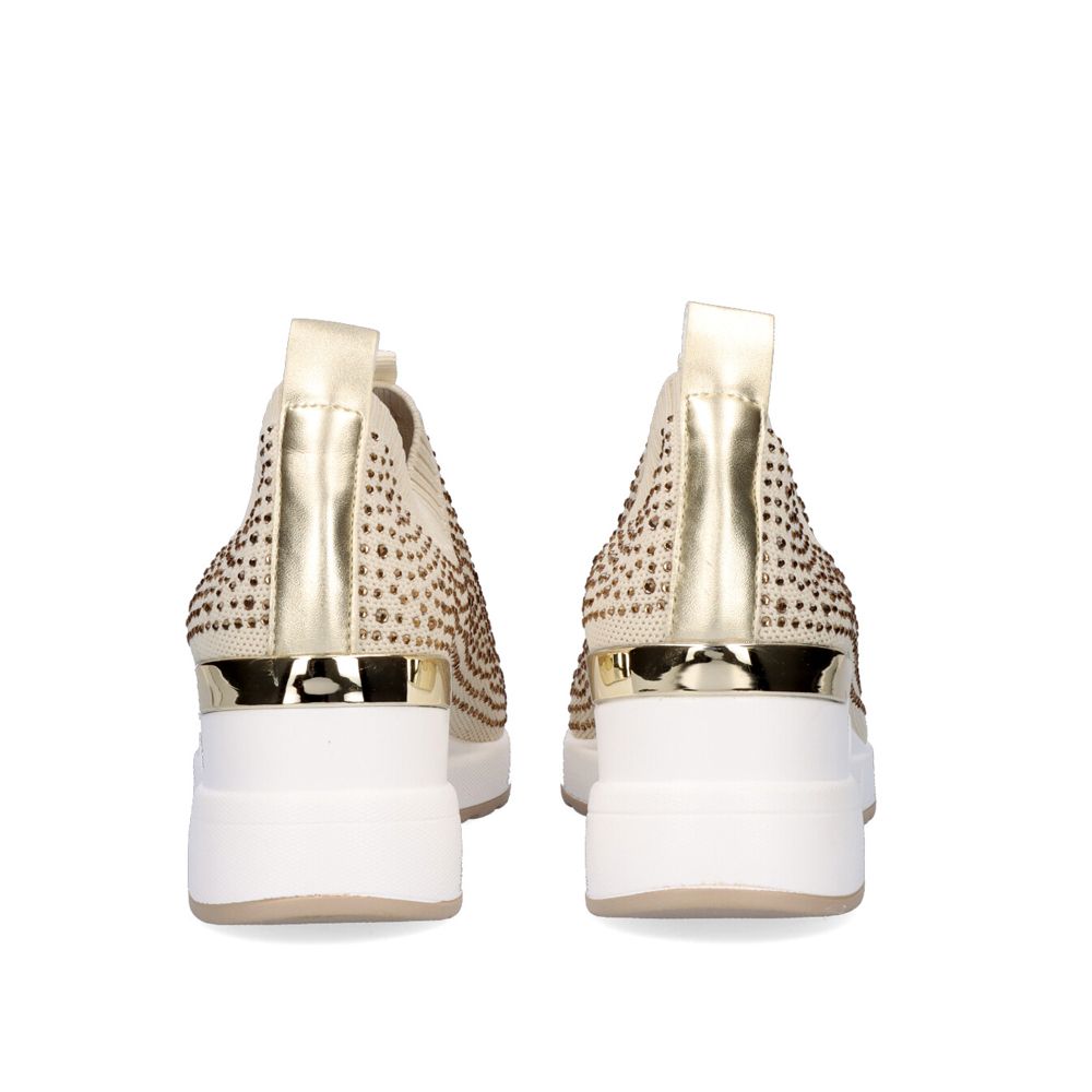 Renato Garini WEX22 gold slip-on wedge sneakers, rear view showing heel pull tabs, metallic trim and raised white soles