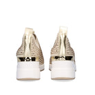 Renato Garini WEX22 gold slip-on wedge sneakers, rear view showing heel pull tabs, metallic trim and raised white soles