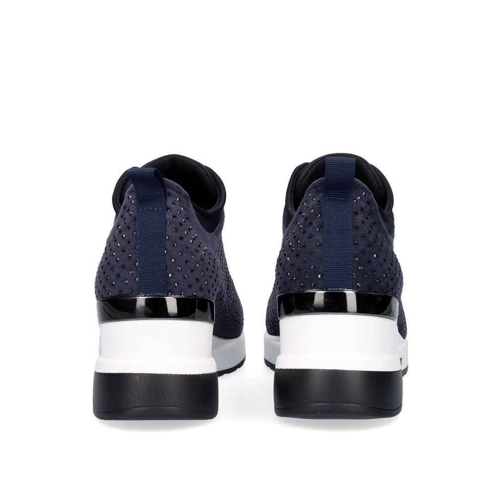 Rear view of Renato Garini WEX24 blue wedge sneakers showing rhinestone heel panels, pull tabs and contrasting black-and-white soles