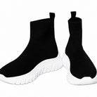 Renato Garini WEX48 black stretch-knit high-top sneakers showing rounded toes, ribbed ankle collars and sculpted white wedge soles, front and angled view